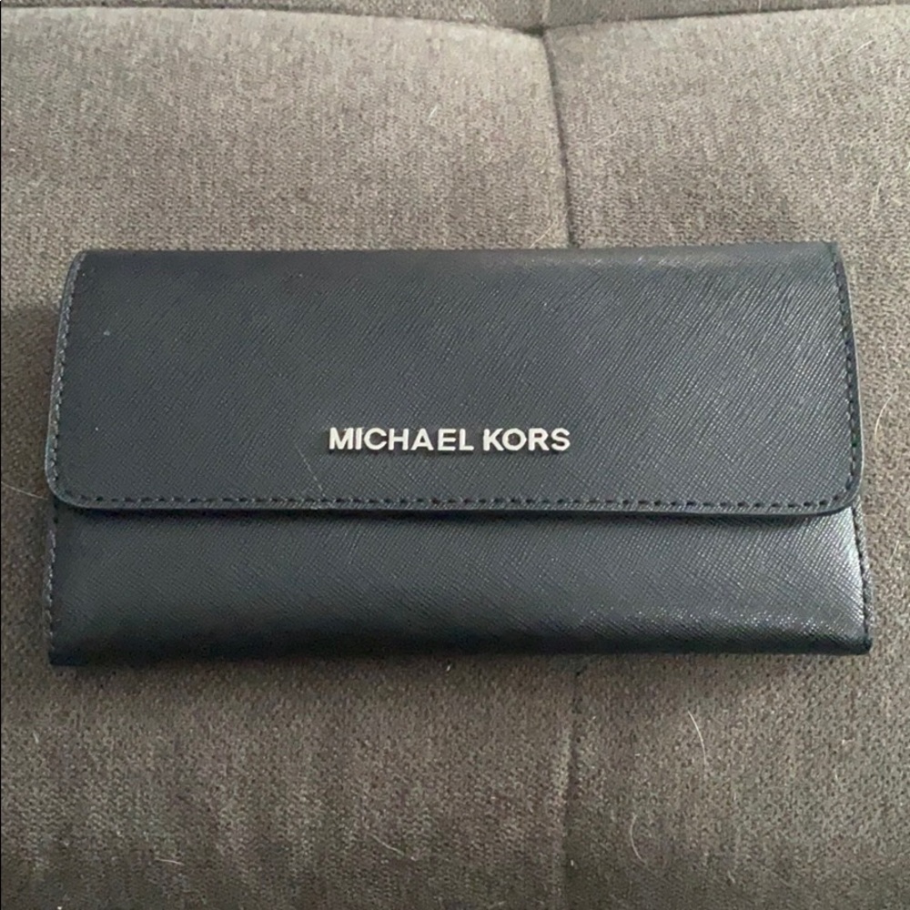 Black Micheal Kors wallet.